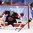 GANGNEUNG, SOUTH KOREA - FEBRUARY 13: Canada's Shannon Szabados #1 attempts to make a glove save against Finland's Venia Hovi #9 during preliminary round action at the PyeongChang 2018 Olympic Winter Games. (Photo by Andre Ringuette/HHOF-IIHF Images)

